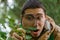 Photo of young botanist with magnifying glass