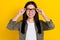 Photo of young charming adorable intelligent female visit oculist wear spectacles isolated on yellow color background