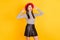 Photo of young cheerful girl happy positive smile hands touch retro hat wear black skirt isolated over yellow color