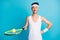 Photo of young excited sportive man excited happy smile hold tennis racket ball isolated over blue color background