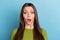 Photo of young girl amazed fake novelty surprised unexpected stupor isolated over blue color background