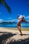 Photo young girl playing on beach snorkeling equipment. Smiling woman spending chill time outdoor summer Bali island