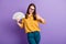 Photo of young girl raise thumb up hold fan cash money wear eyewear yellow shirt isolated purple color background