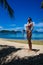 Photo young girl relaxing on beach snorkeling equipment. Smiling woman spending chill time outdoor summer Bali island