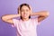 Photo of young girl unhappy unwell cover ears hand headache pain suffer isolated over purple color background