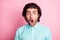 Photo of young handsome bristle man amazed surprised shocked news gossip isolated over pink color background