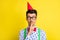 Photo of young handsome man finger touch lips shh keep secret surprise wear party hat isolated over yellow color