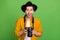 Photo of young happy excited amazed photographer paparazzi catch good shot picture isolated on green color background