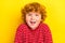 Photo of young happy joyful small boy good mood smile casual clothes isolated on shine yellow color background