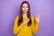 Photo of young lovely woman swear promise to tell the truth justice isolated over violet color background