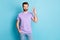 Photo of young man happy show gesture okey sign ad promo perfect choice isolated over blue color background