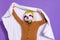 Photo of young man hold duvet bedroom sleepy incognito red panda isolated over purple color background
