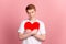 Photo of young man hug embrace paper present heart cupid feelings isolated over pink color background