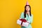 Photo of young minded thoughtful woman look empty space hold present birthday isolated on yellow color background