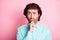Photo of young multiethnic handsome man think thoughtful minded hand touch chin look empty space isolated over pink