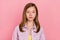 Photo of young pretty girl calm peaceful clever wear casual clothes isolated over pink color background