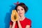 Photo of young pretty woman hold half of papaya eco dieting calories isolated over blue color background
