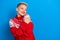 Photo of young relaxed lady short blond haircut hug her new xmas gift red ornament sweater from saint nicholas isolated