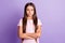 Photo of young serious preteen girl confident crossed hands concentrated focused isolated over violet color background