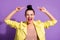 Photo of young shocked amazed positive happy beautiful girl woman point finger at hairstyle bun isolated on purple color