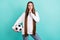Photo of young silent woman hold finger face mouth secret football game bet isolated on pastel teal color background