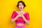 Photo of young stupor woman confused hands chest shocked wear pink knitted crop top unexpected scary movie isolated on