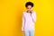 Photo of young unhappy upset afro american sad woman hold hands phone talk isolated on yellow color background