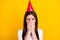 Photo of young unhappy upset lonely stressed depressed girl crying on birthday party isolated on yellow color background
