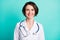 Photo of young woman happy positive smile medic surgeon hospital isolated over turquoise color background