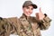 Photo of young woman happy positive smile soldier make selfie show thumb-up like cool advert isolated over white color
