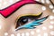 Photo of young woman with professional comic pop art make-up. Creative beauty style. Close up