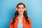 Photo of youngster confident satisfied cheerful smiling woman wear orange jacket listen new sony headphones  on