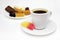 A photo of your white porcelain coffee cup, colorful yellow and red fruit jelly citrus sugar candy. Delicious black turkish coffee