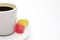 A photo of your white porcelain coffee cup, colorful yellow and red fruit jelly citrus sugar candy. Delicious black turkish coffee