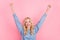 Photo of youth cheerful girl celebrate luck ecstatic lottery awesome isolated over pink color background