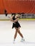 Photo3. A beautiful girl. A lover of skating. In a black elegant dress.