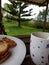 photograph of cup of coffee and toast on the terrace.