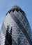 Photograph looking up at the iconic Gherkin Building, 30 St Mary Axe in the City of London, UK