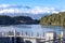 Photograph of mountains and flood waters at the Manapouri Boat Club in New Zealand