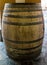 photograph of an old barrel typically used for storing wines or if now old as rustic furniture.