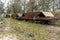 Photograph of old and rusty train carriages