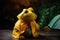 A photograph of a plush toy of a humanoid yellow frog generative AI