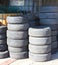 Photograph of stacked car tires used for recycling.