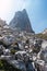 Photograph taken from the base of Picu Urriellu or Naranjo de Bulnes, with the huge stones in the foreground as you arrive