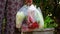 A photograph of a woman whose wife bought things from the market To prepare food for cold hands