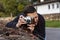 Photographer with analogue film camera outdoors