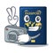Photographer blue passport in the mascot bag