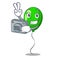 Photographer green ballon with cartoon ribbons beautiful