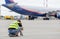 Photographer makes photo of Airbus A330 of Aeroflot Airlines on airfield. Plane spotting, hobby, aviation