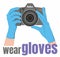 Photographer in medical gloves holds a camera. Safe services. Put on gloves and work. Isolated vector drawing warning of the need